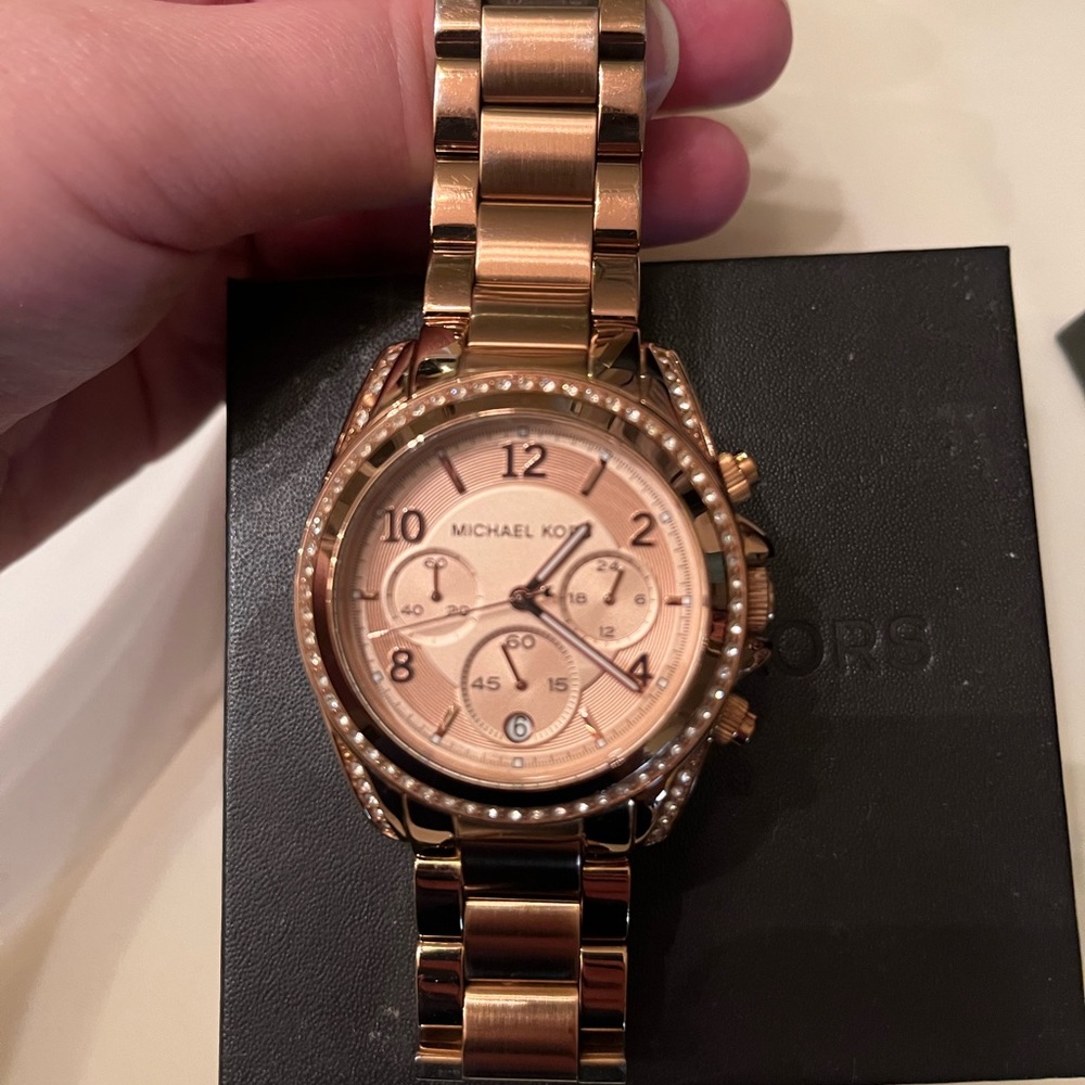 Rose gold Michael kors watch gently used.